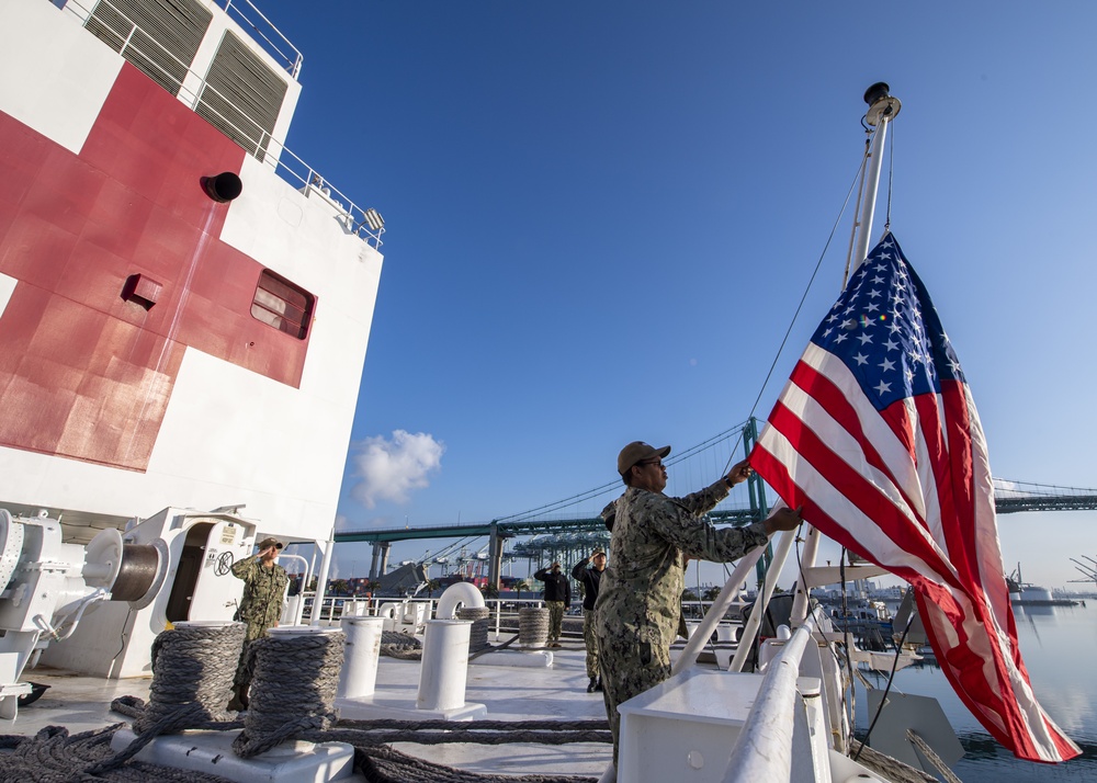 USNS Mercy Raises American Flag