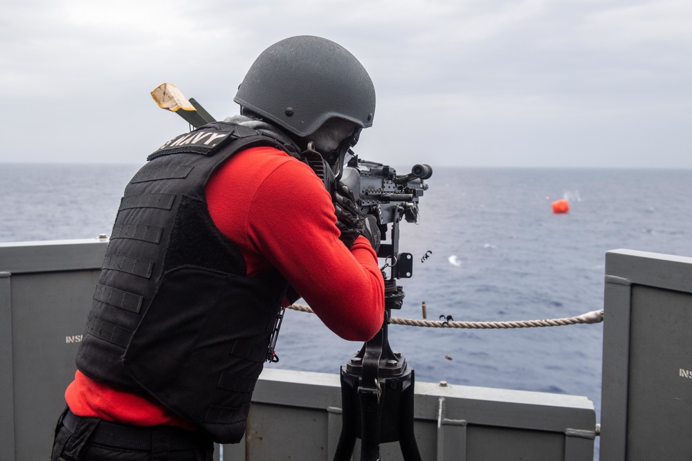 Sailors aboard USS America (LHA 6) conduct live fire exercise