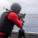 Sailors aboard USS America (LHA 6) conduct live fire exercise