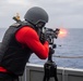 Sailors aboard USS America (LHA 6) conduct live fire exercise