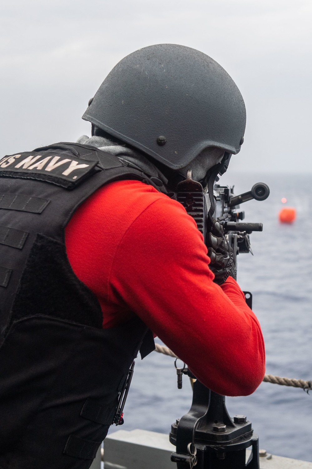 Sailors aboard USS America (LHA 6) conduct live fire exercise