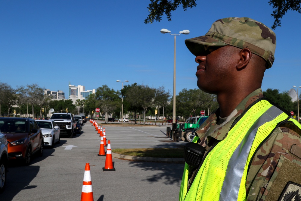Soldiers stands ready to assist with Haitian-Creole translation