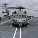 An MH-60S Sea Hawk prepares to take off from the flight deck of the USS Gerald R. Ford