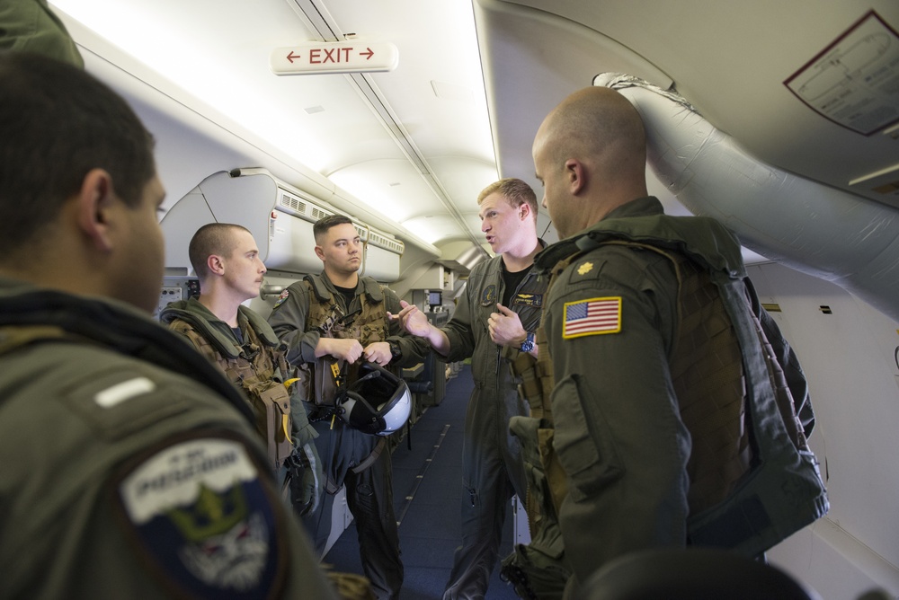 LT Knight Debriefs Mission Crew Following NATOPS Drill