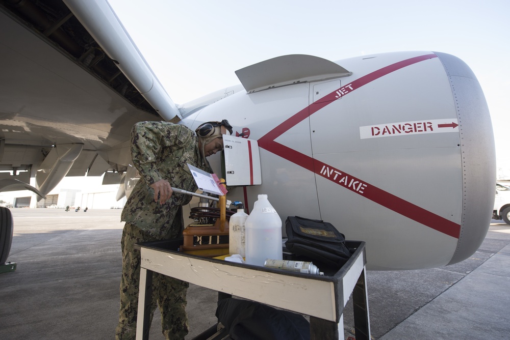 ATAR Merard Conducts Oil Inspection on P-8A Engine