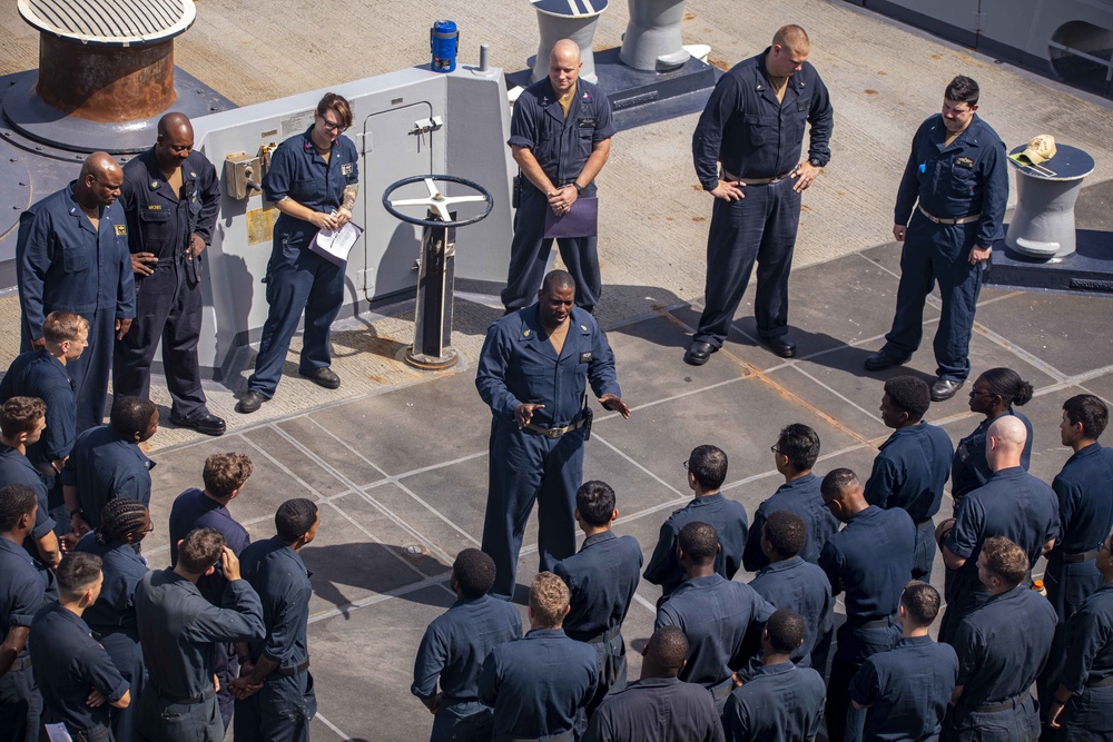 Sailors attend a departmental all hands call