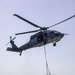 Sailors and Marines take part in a replenishment-at-sea