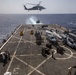 Sailors and Marines take part in a replenishment-at-sea