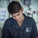 Sailors and Marines take part in a replenishment-at-sea