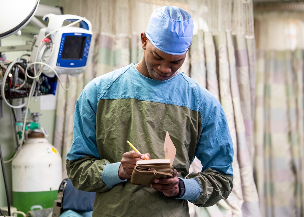 USNS Mercy Sailor Prepares for Morning Operations