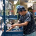 USNS Mercy Sailor Checks Medical Supply Inventory