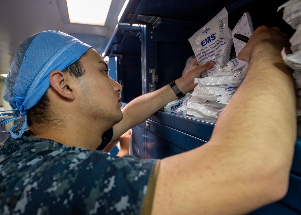 USNS Mercy Sailor Takes Inventory of the Medical Supplies