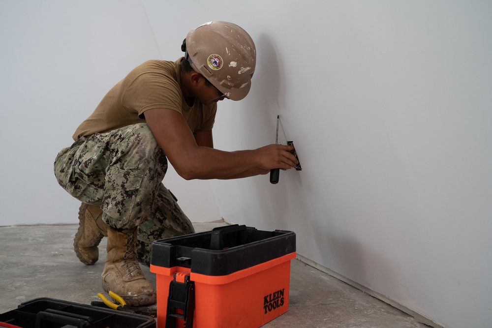 U.S. Navy Seabees with NMCB-5’s Detail Pohnpei construct Sokehs Pah Elementary School