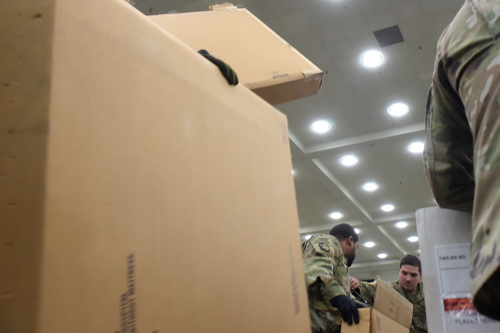 Maryland Army National Guard Guard members set up auxiliary medical station, prep for COVID-19 patients