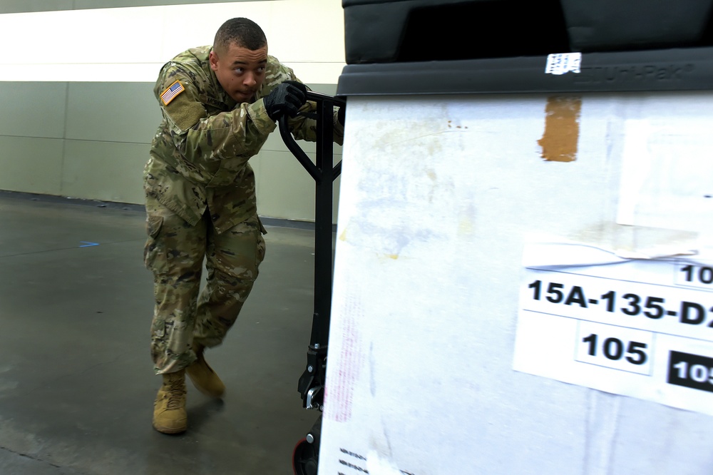 Maryland Army National Guard Guard members set up auxiliary medical station, prep for COVID-19 patients