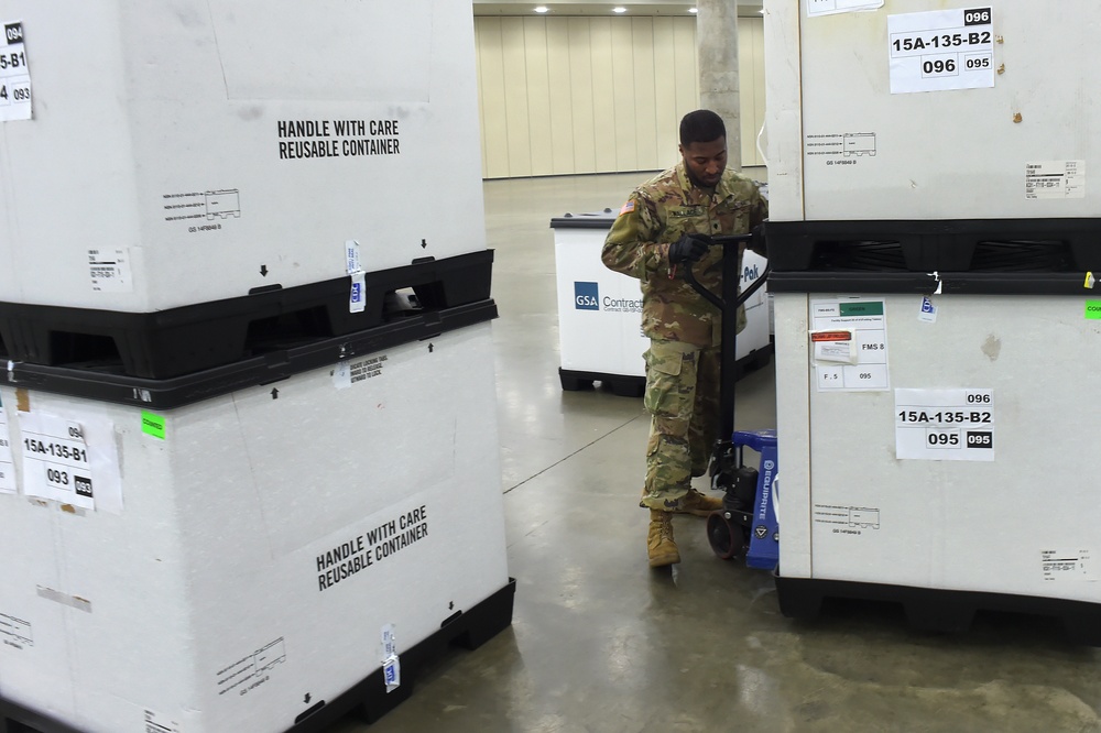 Maryland Army National Guard Guard members set up auxiliary medical station, prep for COVID-19 patients