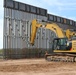 South Pacific Border District contractor using an excavator with a panel rack attachment
