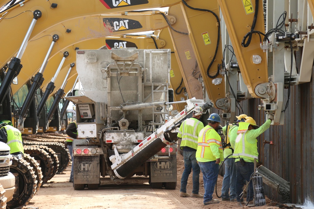 South Pacific Border District contractor crews pour concrete into a trench