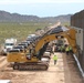 South Pacific Border District contractor’s eight excavators hold 32 barrier panels
