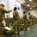 Taking temperatures of Basic Combat Training graduates