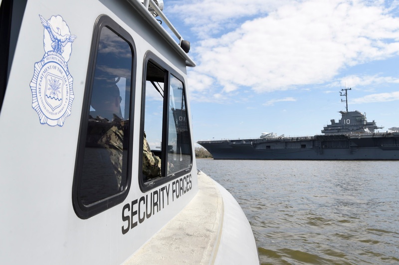 Harbor Patrol Passes By USS Yorktown