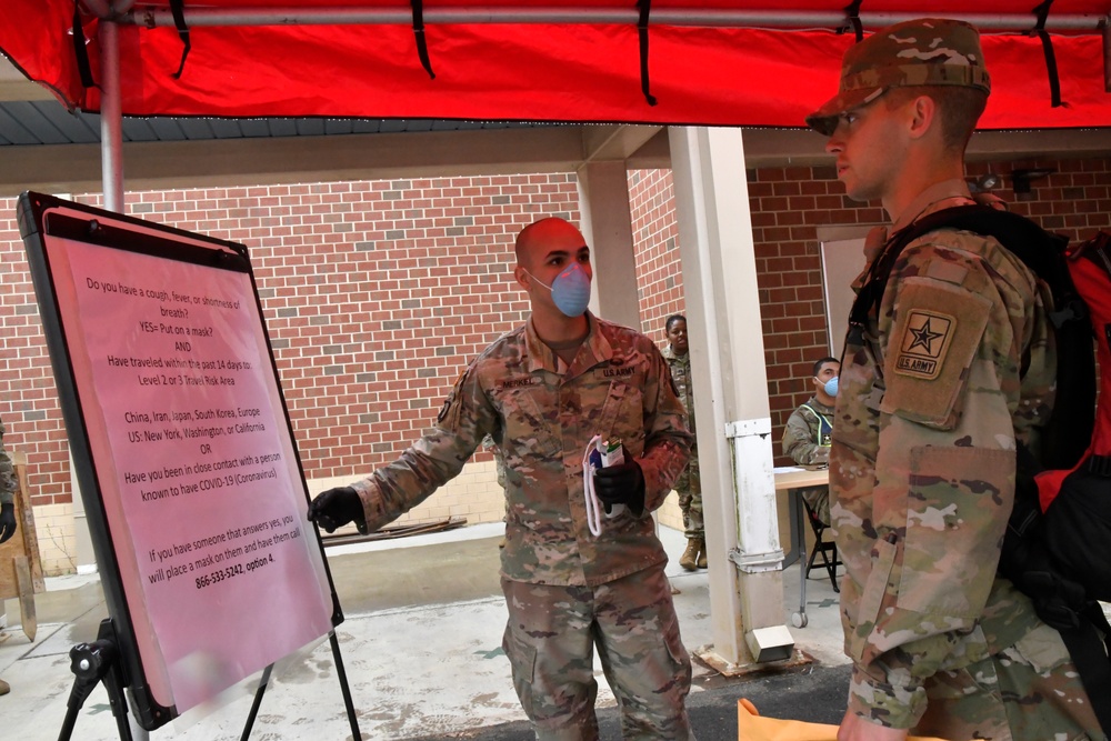 Advanced individual training troops transported to Fort Lee under stringent medical guidelines