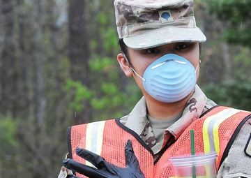 Advanced individual training troops transported to Fort Lee under stringent medical guidelines