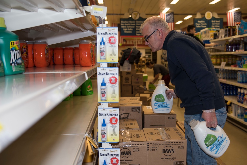 501st Combat Support Wing volunteers restock commissary