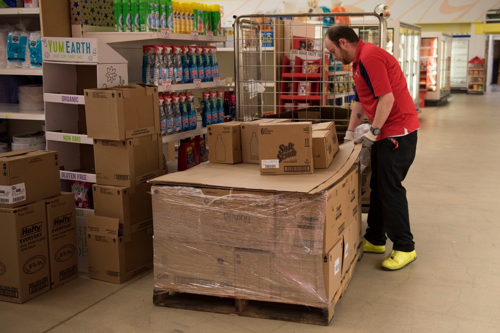 501st Combat Support Wing volunteers restock commissary