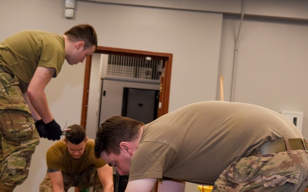 Keesler Airmen install cable in new JOC for Task Force-Southeast