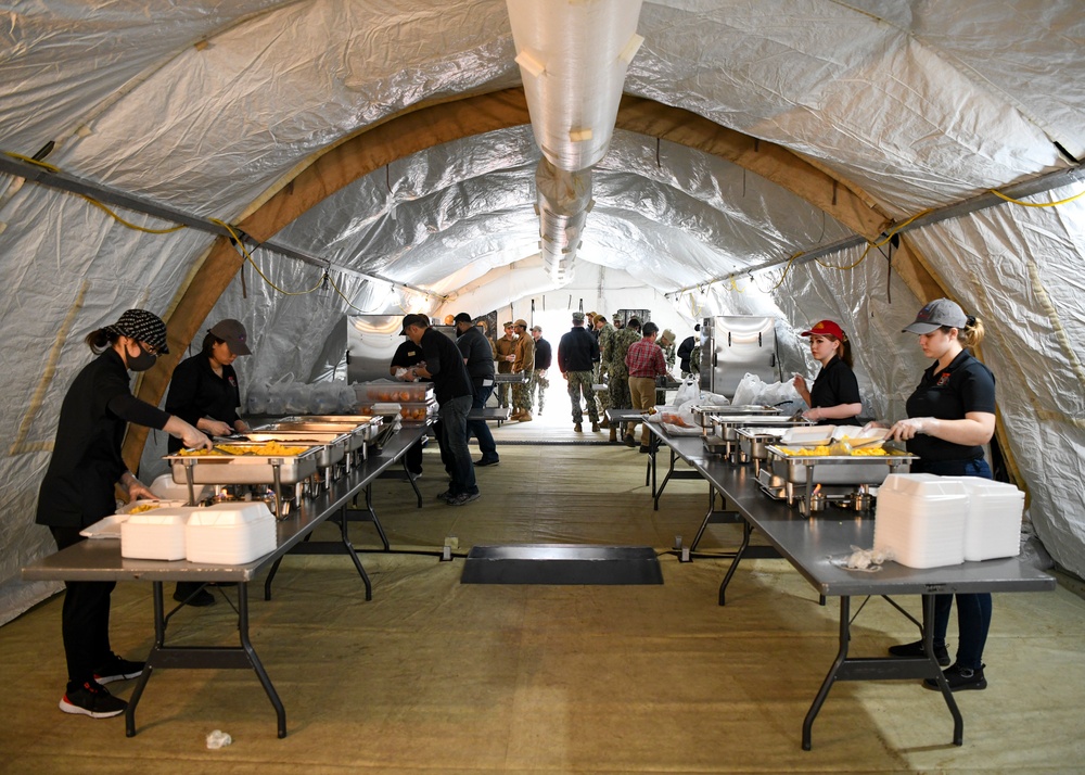 VAQ-209 and 35th FSS Prepare Meals for ROM Personnel