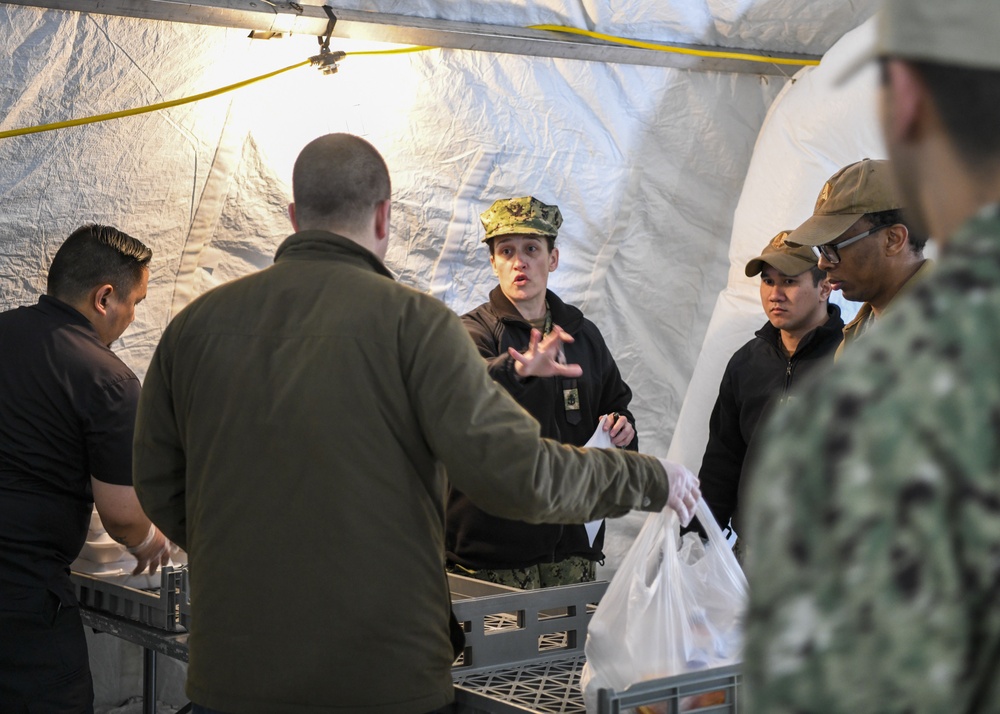 VAQ-209 and 35th FSS Prepare Meals for ROM Personnel