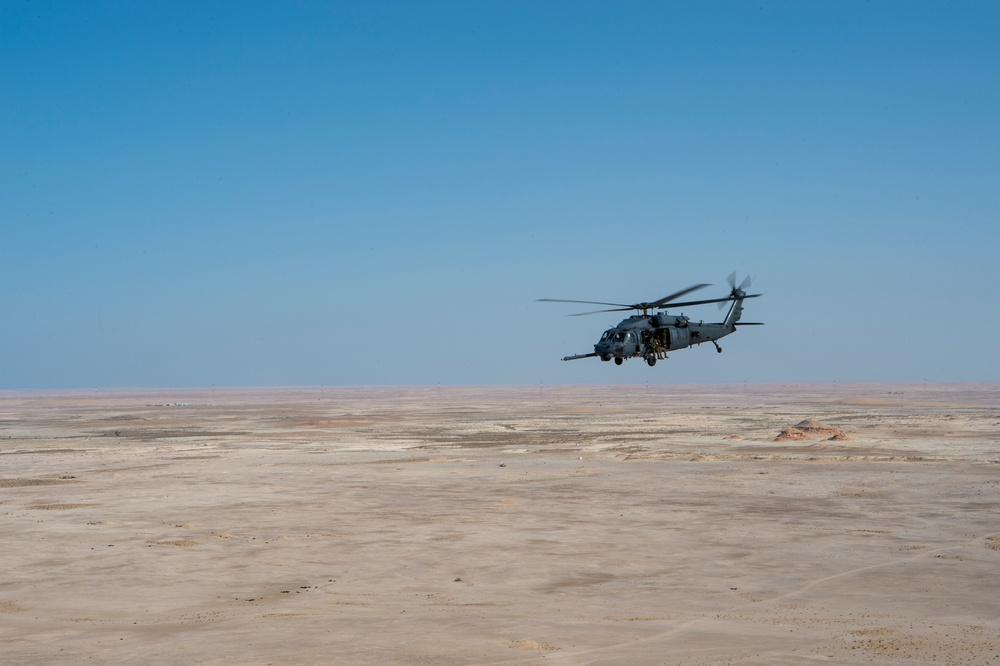 66th Expeditionary Rescue Squadron train in a HH-60G Pave Hawk over Qatar