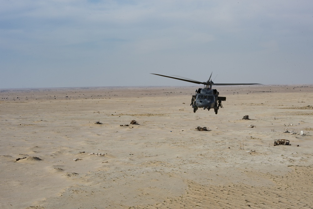 66th Expeditionary Rescue Squadron train in a HH-60G Pave Hawk over Qatar