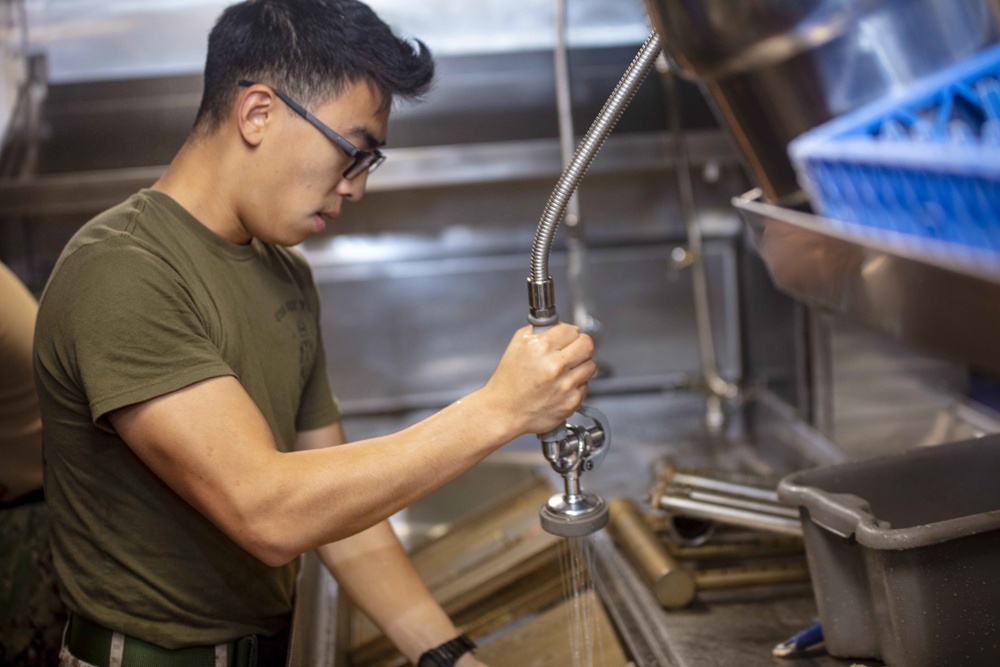 Marine cleans in the scullery