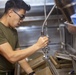 Marine cleans in the scullery