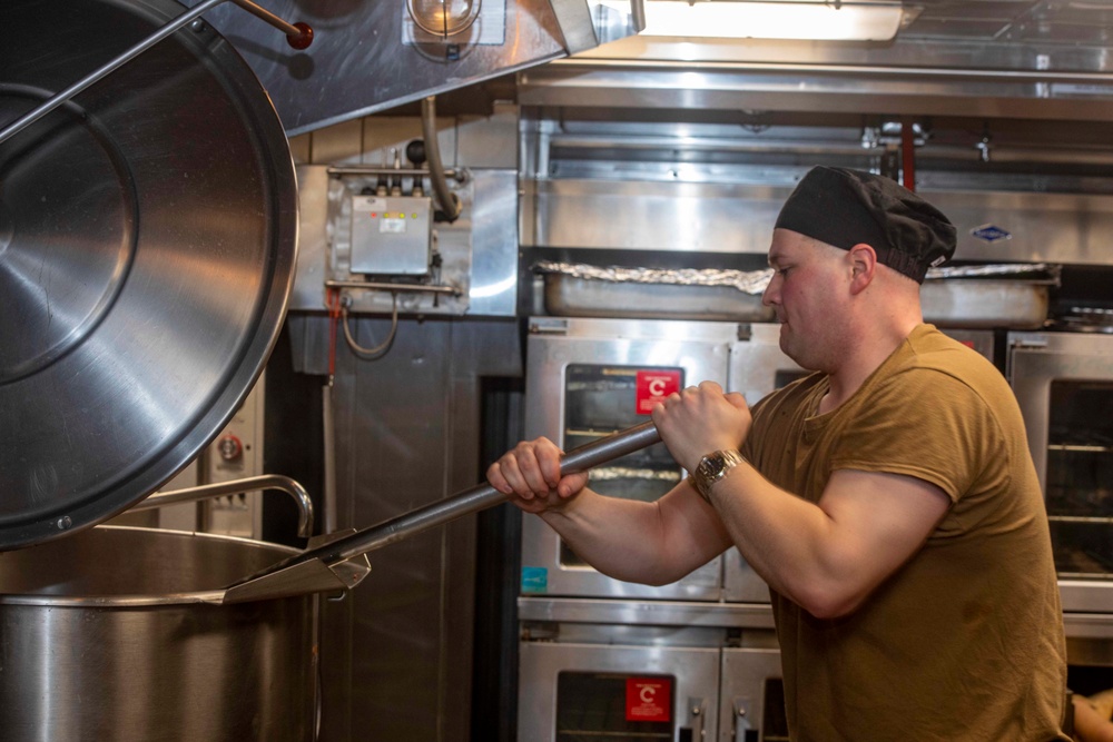 Sailor cook in the galley