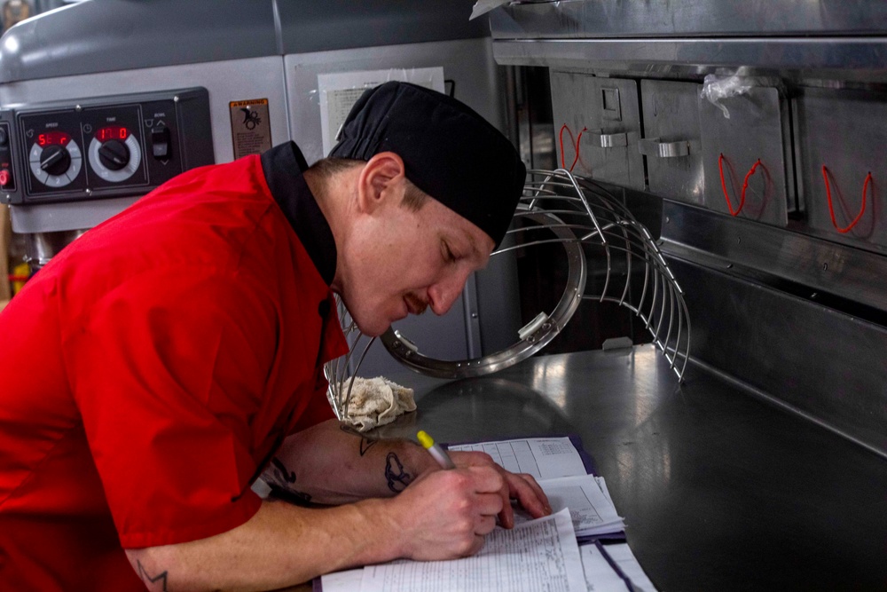 Sailor cook in the galley