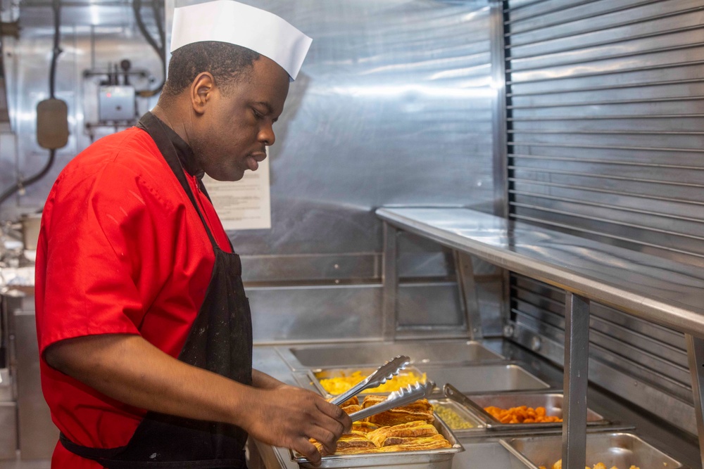 Sailor cook in the galley