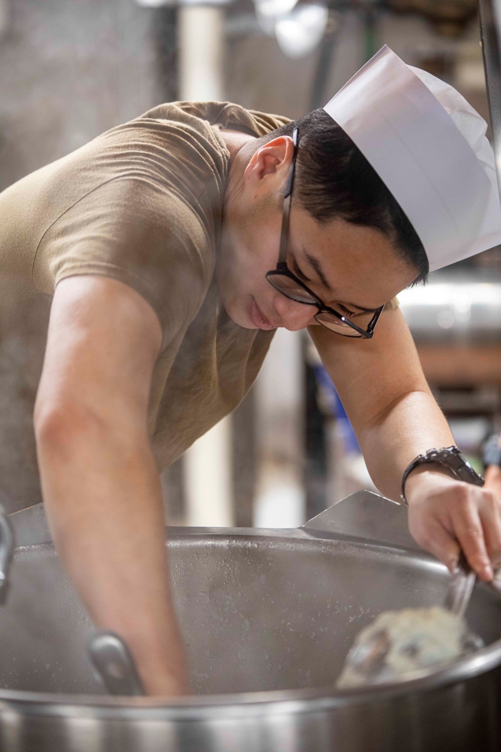 Sailor cook in the galley