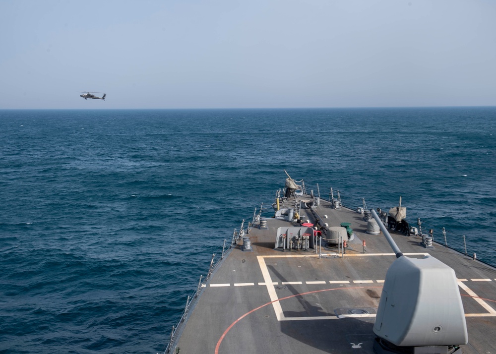 U.S. Navy Surface Forces and Army Attack Helicopters Conduct Integration Operations in Arabian Gulf