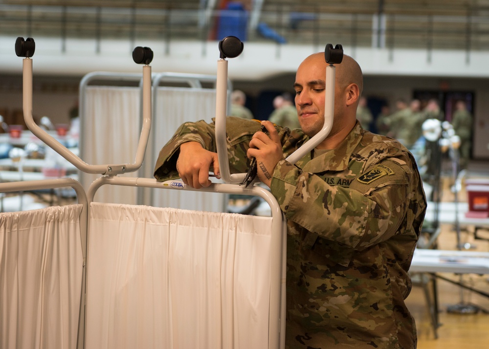 Connecticut National Guard sets up federal medical station equipment at Southern Connecticut State University