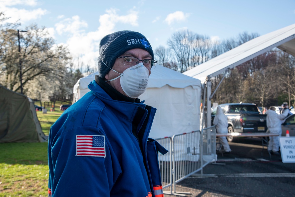 New Jersey National Guardsmen direct traffic to support local agencies during COVID-19 testing