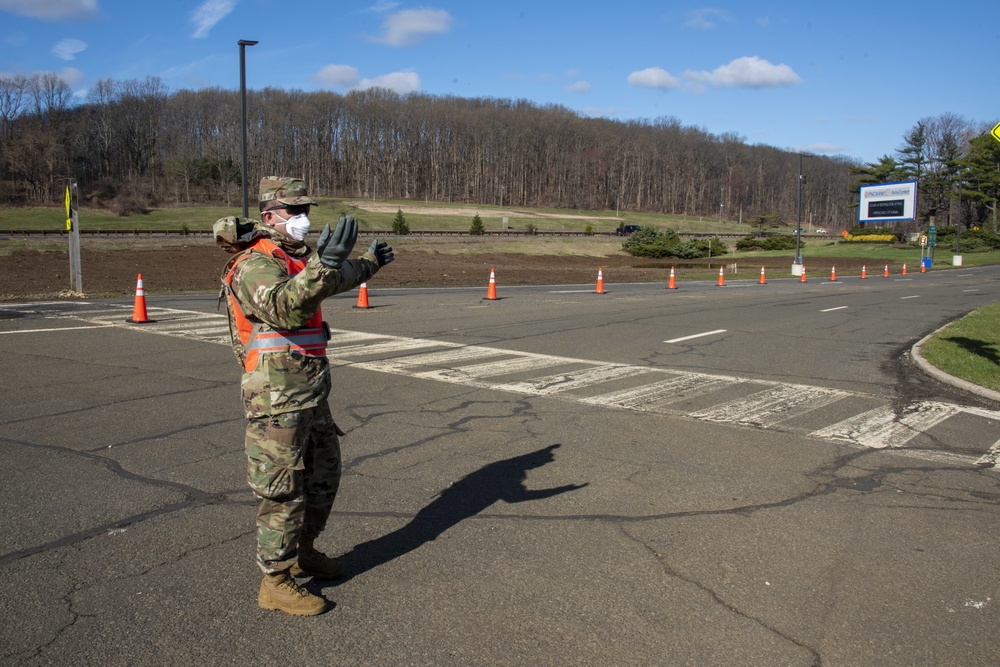 New Jersey National Guardsmen direct traffic to support local agencies during COVID-19 testing