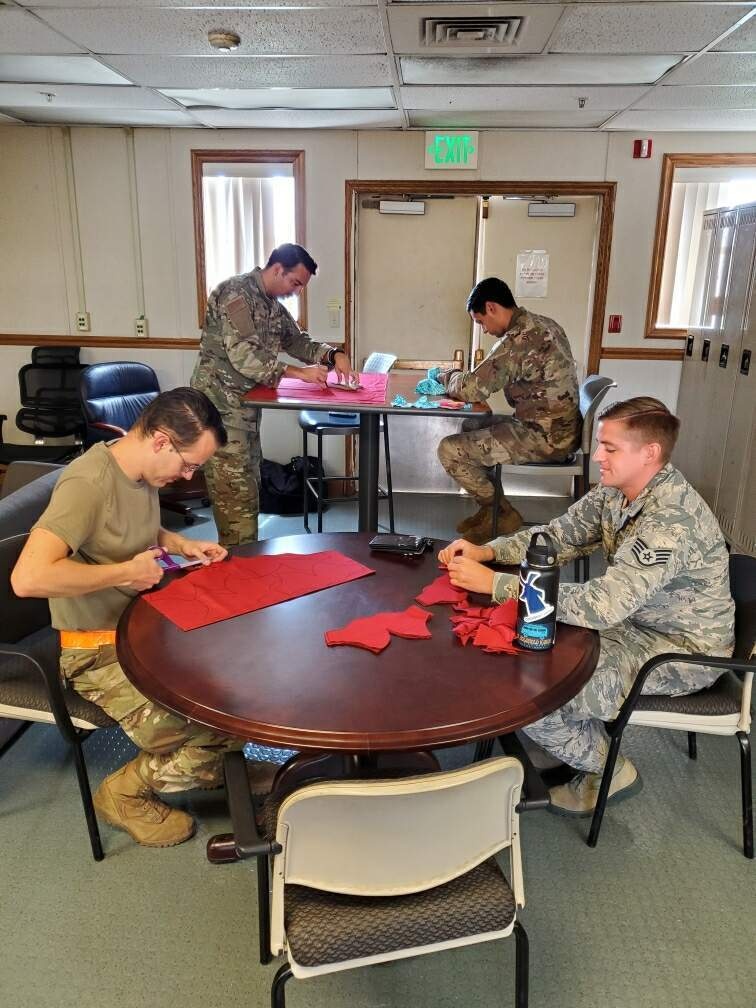 735th AMS makes masks for medical response