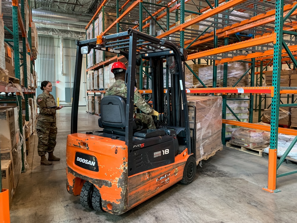 Oregon National Guard prepares supplies for delivery in response to COVID-19