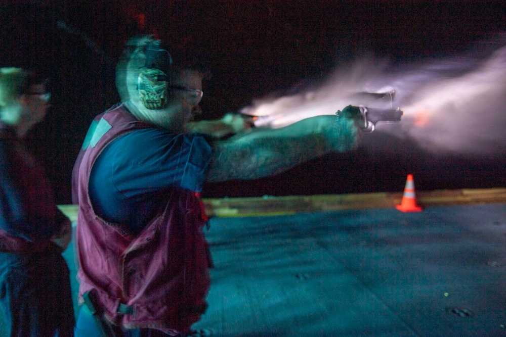 USS America Conducts low-light small arms gun shoot