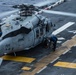 Marines with 31st MEU and Sailors with the USS America conduct flight operations on the America