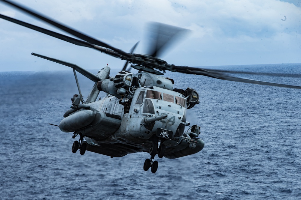 Marines with 31st MEU and Sailors with the USS America conduct flight operations on the America