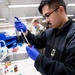 USNS Mercy Sailor Works in Laboratory